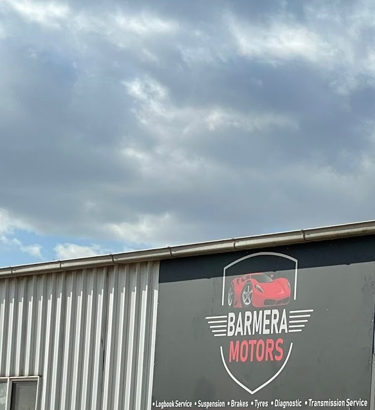 Barmera Motors shed sign listing logbook service, suspension, brakes, tyres, diagnostic and transmission service